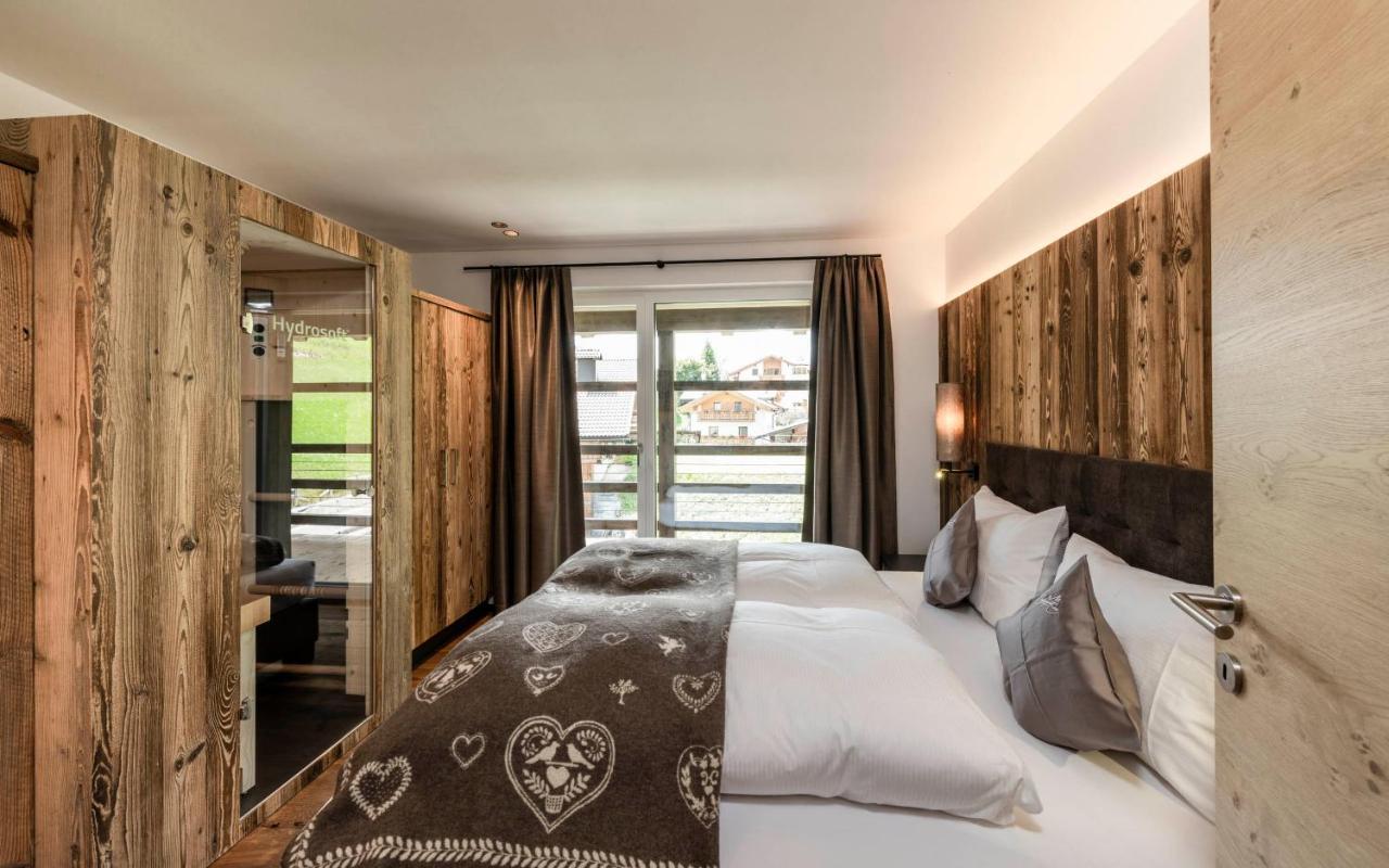 Cadepunt The Dolomites Lodge Сельва-ди-Валь-Гардена Экстерьер фото